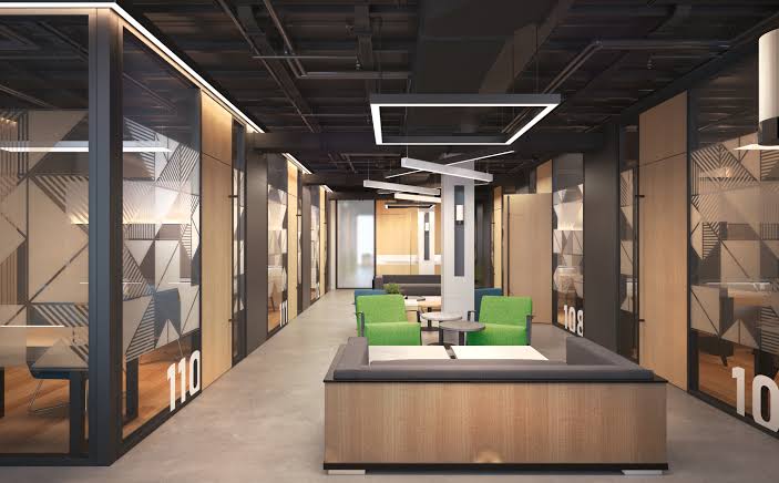 Professionals networking in a bright coworking lounge area