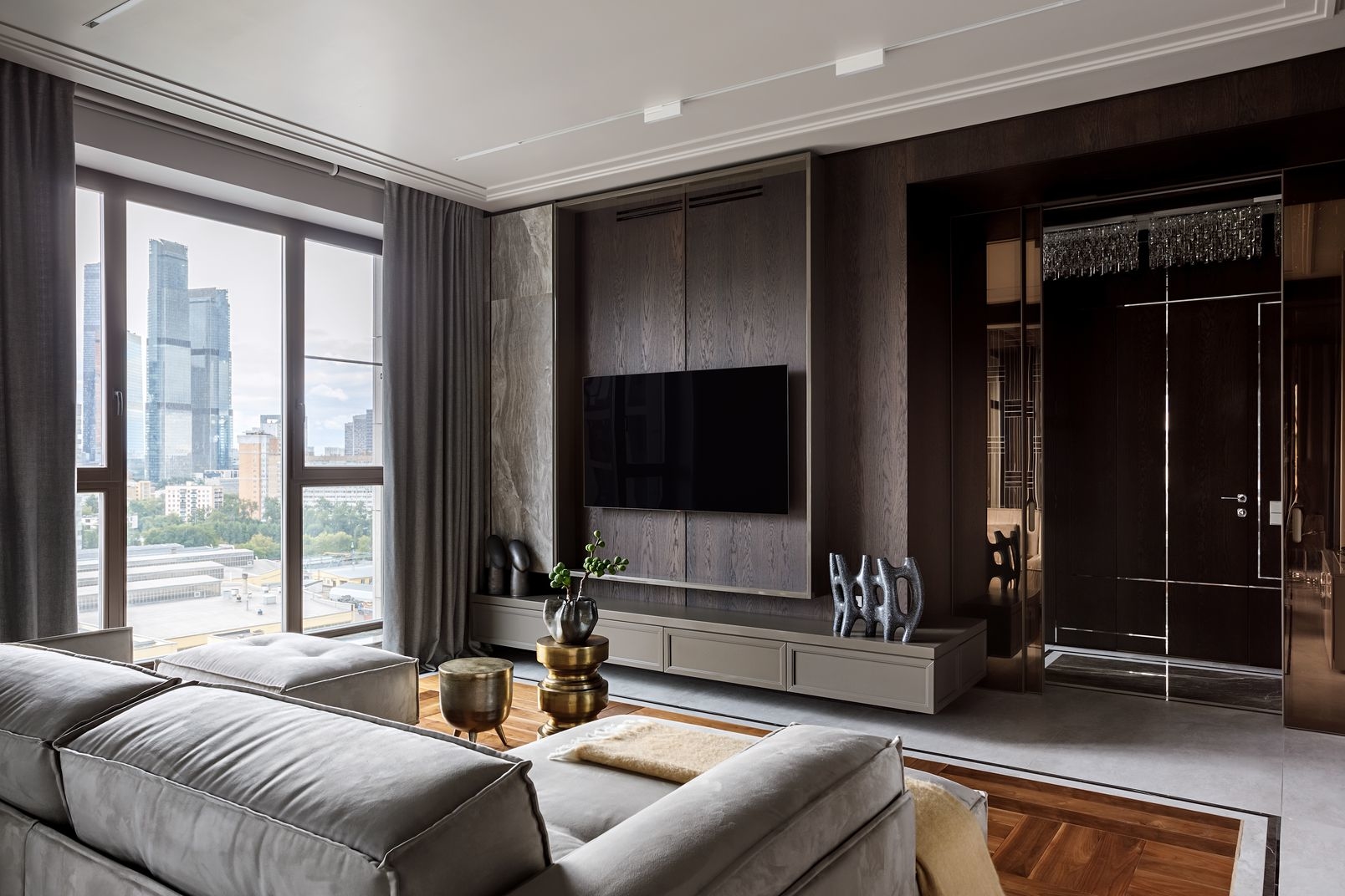 Refined apartment interior with custom furniture and balanced neutral colours