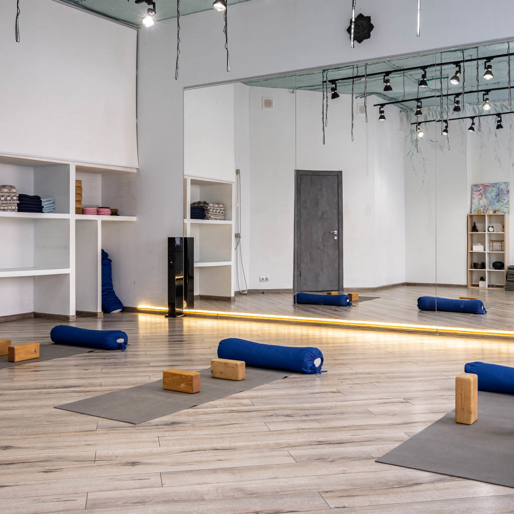 Supportive group yoga class at StillRoot Yoga