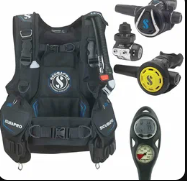 Diver preparing with high-end rental equipment near the coast