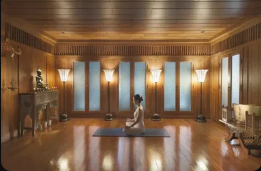 Instructor guiding meditation in Florence studio